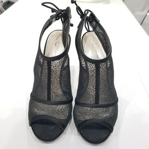 Black Mesh Caparros Booties. Size 5